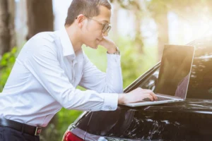 Driver comparing affordable car insurance options in California